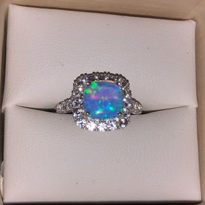 Blue lab created opal ring from reed jewelers